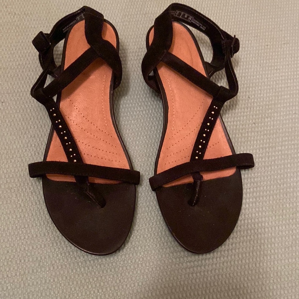Black sandals with silver studs.